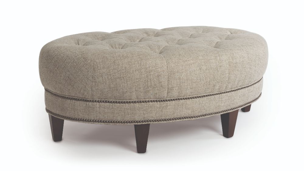 Modern beige upholstered ottoman with wooden legs for custom furniture lovers.